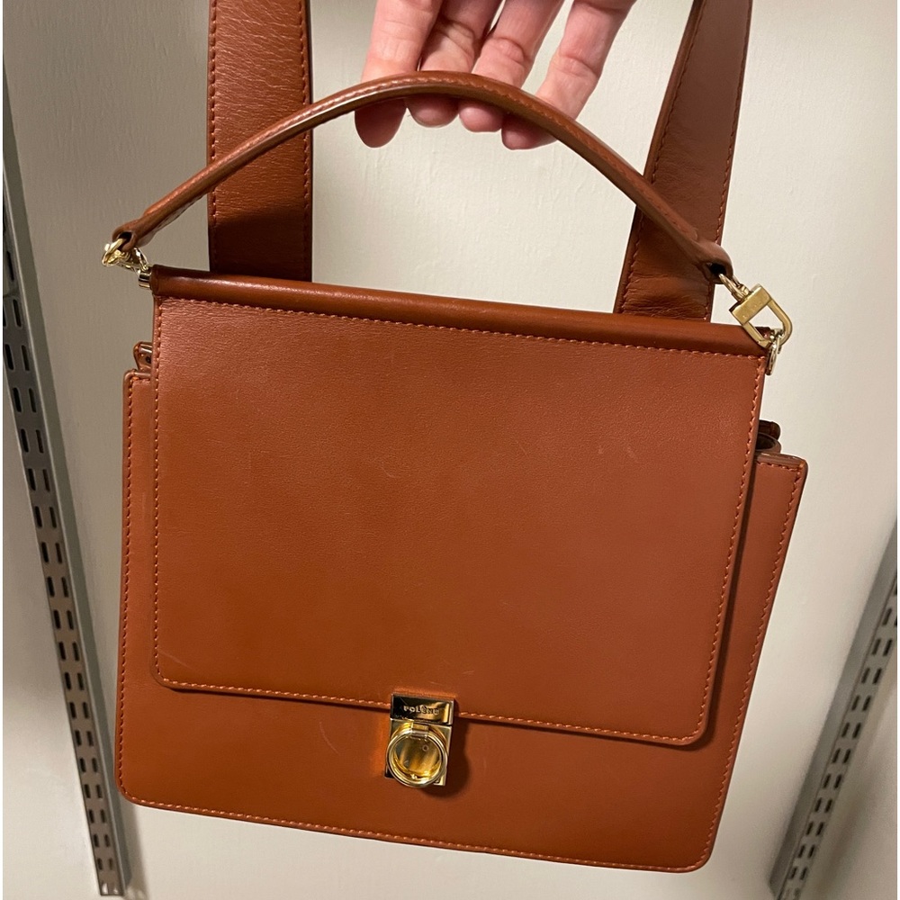 Polene Numero Sept (#7) leather crossbody body in cognac with gold hardware.